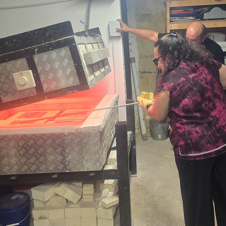Loading work into a GlassXpressions studio kiln